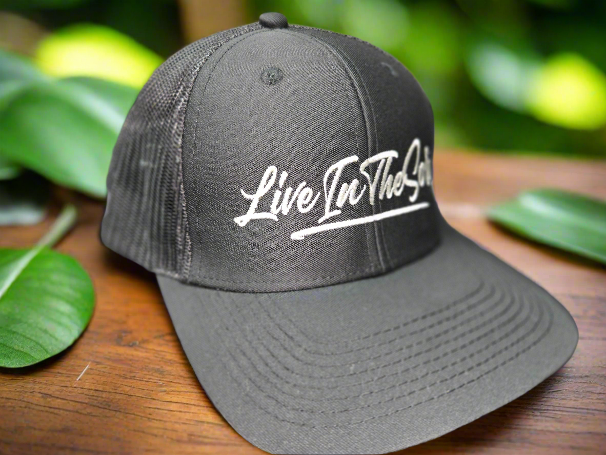 LIVEINTHESORE Trucker Hat