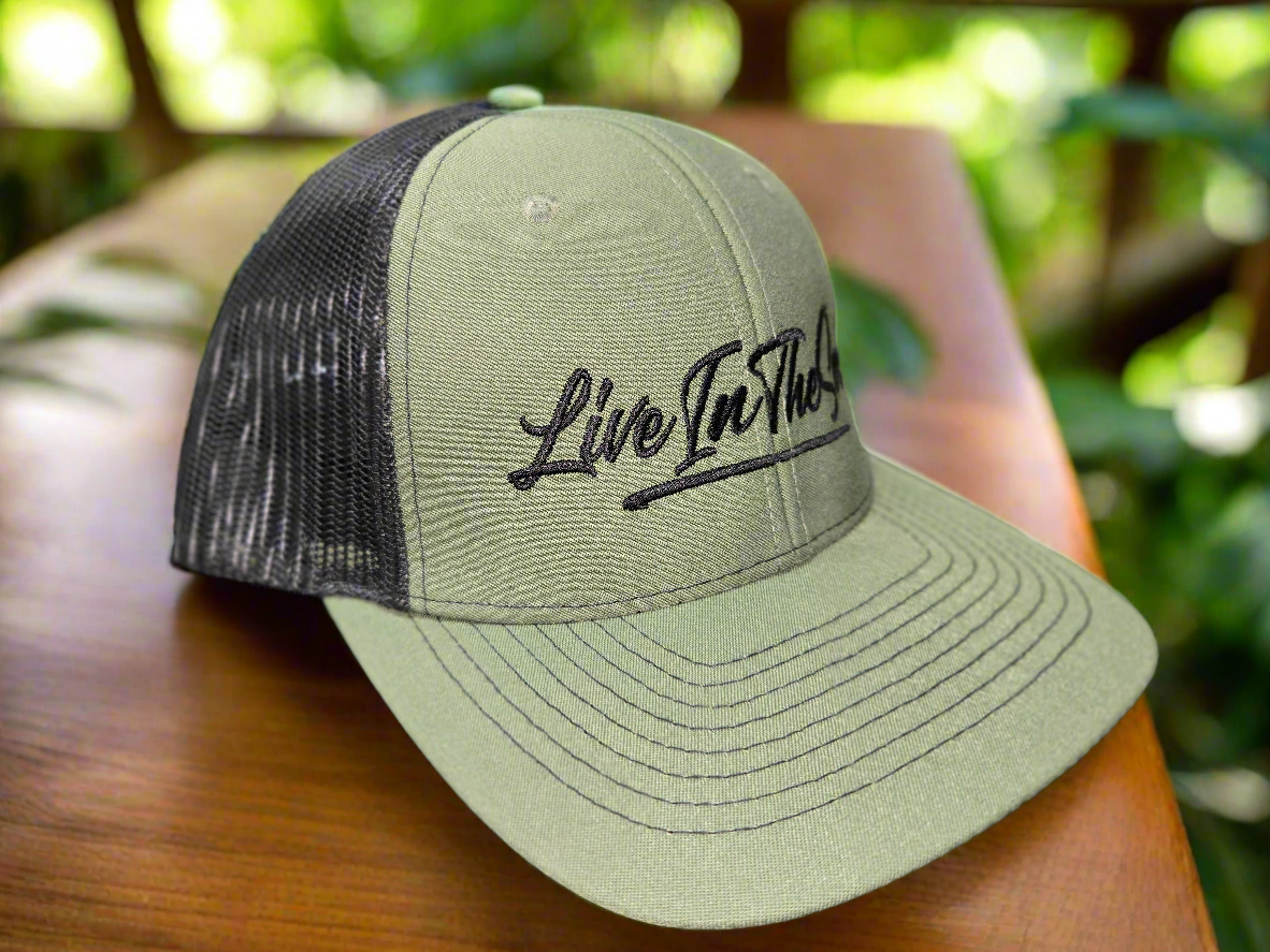 LIVEINTHESORE Trucker Hat