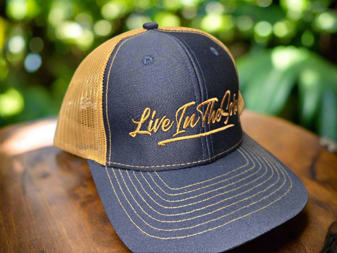 LIVEINTHESORE Trucker Hat