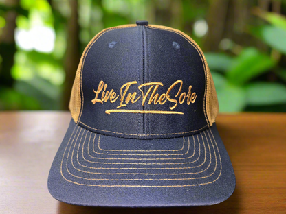 LIVEINTHESORE Trucker Hat